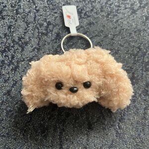 twisting stick dog keychain